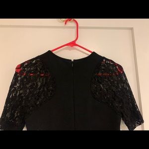 Black mini dress with lace sleeves
